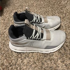 Lightly worn on clouds. Will wash before shipping